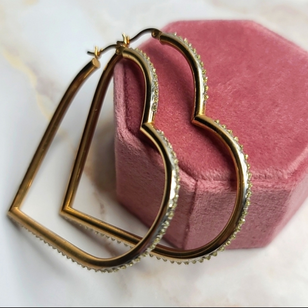 Diamond accent heart shaped hoops gold over sterling silver